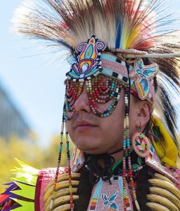 Man dressed in Native American attire