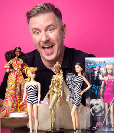 Bill Greening with Barbie dolls